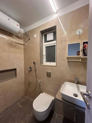 Bathroom in 1 BHK Apartment at Pratham 5TH Element, Andheri West – for Rent