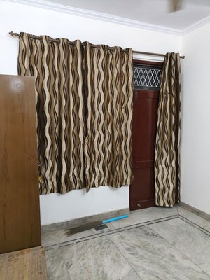 Bedroom in 2 BHK Builder Floor at Dwarka Mor – for Rent