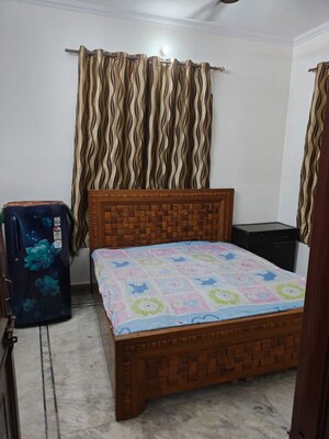Bedroom in 2 BHK Builder Floor at Dwarka Mor – for Rent