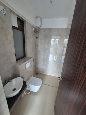 Bathroom in 2 BHK Apartment at Raymond Ten X Habitat, Pokhran Road No Two – for Rent