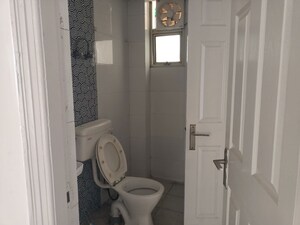 Bathroom in 2 BHK Apartment at Ajnara Gen X, Dundahera – for Sale