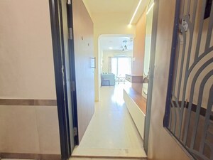 Building Lobby in 1.5 BHK Apartment at Dosti West County, Balkum Pada – for Sale