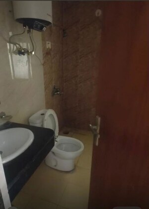 Bathroom in 3 BHK Apartment at Nimbus The Golden Palm, Sector 168 – for Rent