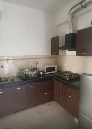 Kitchen in 3 BHK Apartment at Nimbus The Golden Palm, Sector 168 – for Rent