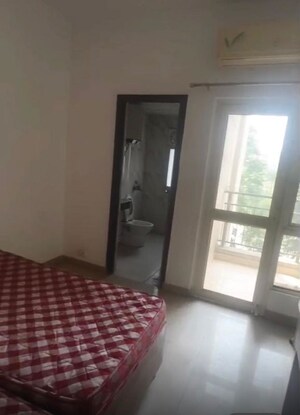 Bedroom in 3 BHK Apartment at Nimbus The Golden Palm, Sector 168 – for Rent