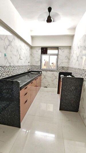 Kitchen in 2 BHK Apartment at Shiv Shakti Tower 28, Malad East – for Rent