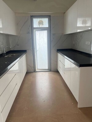 Kitchen in 2 BHK Apartment at Ruparel Ariana, Parel – for Sale