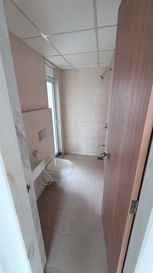Bathroom in 1 BHK Apartment at Puraniks Kanchanpushp Complex, Kavesar – for Rent