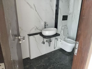 Bathroom in 3 BHK Apartment at Ruparel Ariana, Parel – for Sale