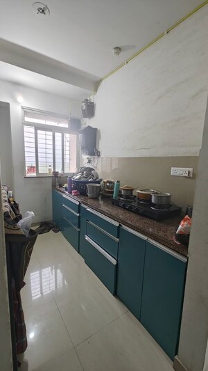 Kitchen in 2 BHK Apartment at Cosmos Regency Kavesar, Kavesar – for Rent