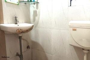 Bathroom in 1 BHK Apartment at Akash Sagar Classics, Wadgaon Sheri – for Rent