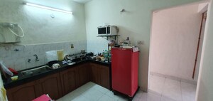 Kitchen in 2 BHK Apartment at Ganga Hamlet, Viman Nagar – for Rent