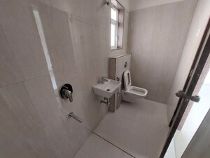 Bathroom in 2 BHK Apartment at Puranik Grand Central, Vartak Nagar – for Sale