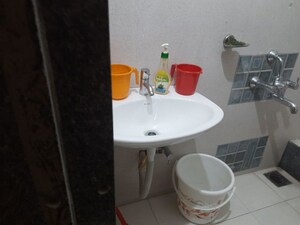 Bathroom in 2 BHK Apartment at Gokhale Anuprita, Dahanukar Colony – for Rent