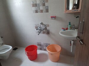 Bathroom in 2 BHK Apartment at Gokhale Anuprita, Dahanukar Colony – for Rent
