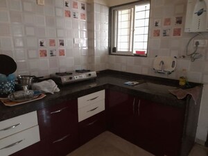 Kitchen in 2 BHK Apartment at Gokhale Anuprita, Dahanukar Colony – for Rent