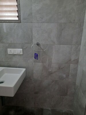 Bathroom in 3 BHK Apartment at Goyal Riviera Springs, Shela – for Sale