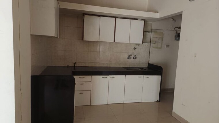 Kitchen, mittal-brothers-whistling-palms 2 Bedroom 1000 Sq.Ft. Apartment In Wakad Pune 10578454