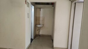 Building Lobby in 2 BHK Apartment at Mittal Brothers Whistling Palms, Wakad – for Rent