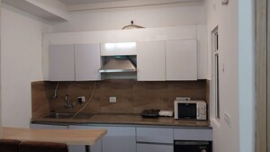 Kitchen in Studio Apartment at Nimbus The Golden Palm, Sector 168 – for Sale