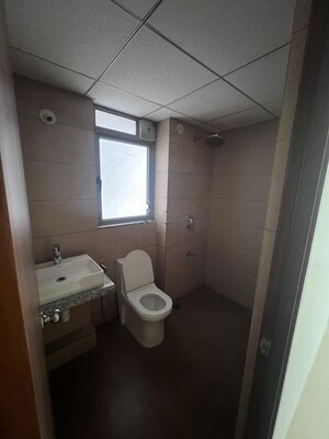 Bathroom in 2 BHK Apartment at Kalpataru Immensa, Kolshet Road – for Rent