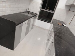 Kitchen in 2 BHK Apartment at Kalpataru Immensa, Kolshet Road – for Rent