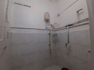 Bathroom in 1 BHK Apartment at Sunrise CHS Malad East, Malad East – for Rent