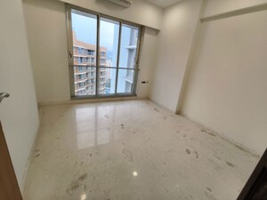 Room in 2 BHK Apartment at Ekta Tripolis, Goregaon West – for Sale