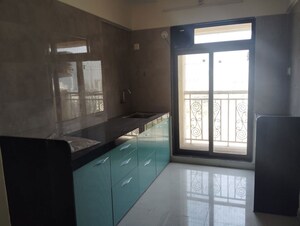 Kitchen in 2 BHK Apartment at Godrej Emerald, Ghodbunder Road – for Rent