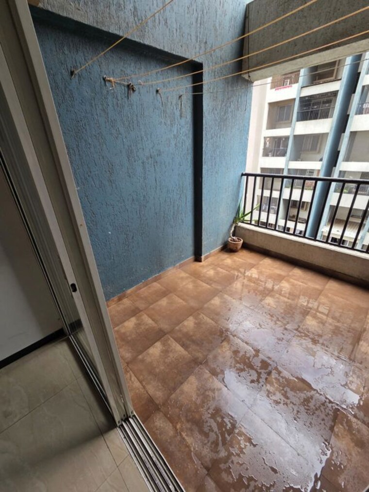 Balcony, casa-imperia 2 Bedroom 990 Sq.Ft. Apartment In Wakad Pune 10578580