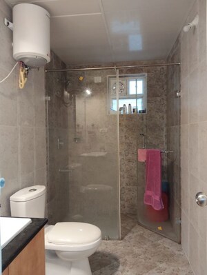 Bathroom in 3 BHK Apartment at Mantri Webcity, Hennur Road – for Rent