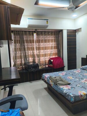 Bedroom in 2 BHK Apartment at Vikas Park CHS, Malad West – for Rent