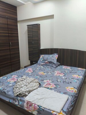 Bedroom in 2 BHK Apartment at Vikas Park CHS, Malad West – for Rent