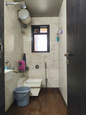 Bathroom in 2 BHK Apartment at Vikas Park CHS, Malad West – for Rent