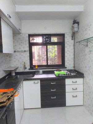 Kitchen in 2 BHK Apartment at Vikas Park CHS, Malad West – for Rent