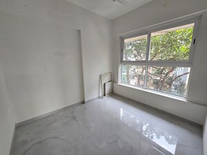 Bedroom in 3 BHK Apartment at Anmol Priti, Kandivali West – for Sale