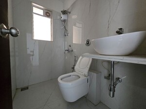 Bathroom in 3 BHK Apartment at Anmol Priti, Kandivali West – for Sale