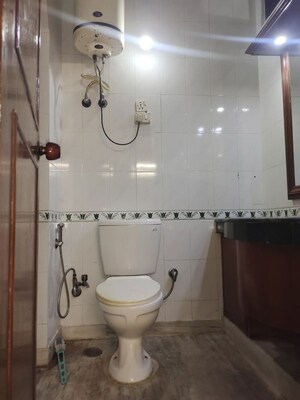 Bathroom in 2 BHK Builder Floor at East Of Kailash – for Rent