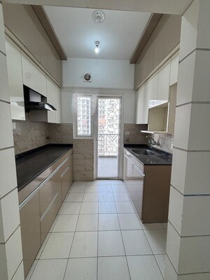 Kitchen in 2.5 BHK Apartment at Arihant Amber, Sector 1 Greater Noida – for Sale