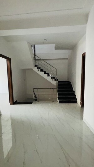 Staircase in 3.5 BHK Villa at Kingson Green Villa Phase 2, Panchsheel Green – for Sale