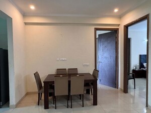 Living Room in 4 BHK Apartment at Affinity Greens, International Airport Road – for Rent