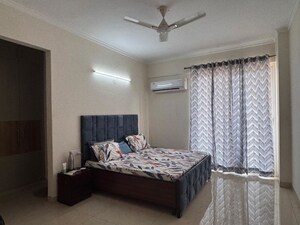 Bedroom in 4 BHK Apartment at Affinity Greens, International Airport Road – for Rent