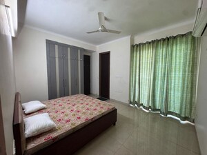 Bedroom in 4 BHK Apartment at Affinity Greens, International Airport Road – for Rent
