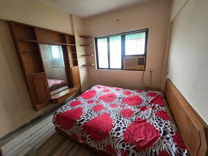 Bedroom in 2 BHK Apartment at Pawanputra CHS, Kandivali West – for Rent