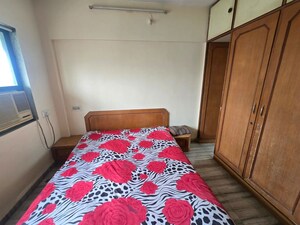 Bedroom in 2 BHK Apartment at Pawanputra CHS, Kandivali West – for Rent
