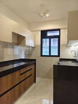 Kitchen in 1 BHK Apartment at Pawan Baug CHS, Malad West – for Sale