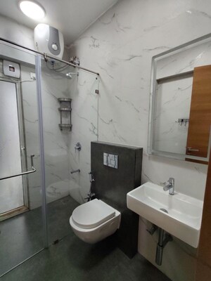 Bathroom in 3 BHK Apartment at Eskay Itus Apartment, Andheri West – for Rent