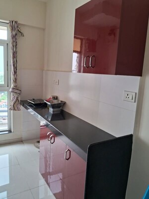 Kitchen in 1 BHK Apartment at Metropolis Bayside, Kasarvadavali – for Rent