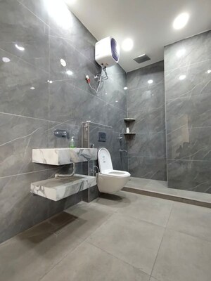 Bathroom in 4 BHK Apartment at Vivek Vihar – for Rent