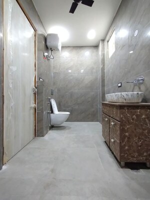 Bathroom in 4 BHK Apartment at Vivek Vihar – for Rent